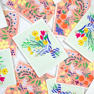 Scattered seed cards showing detailed floral artwork in pink and mint cards, seed cards, bloom seed cards, floral cards,