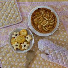 Load image into Gallery viewer, assorted baked good on block printed kitchen towel oven mitts and poy holder. 