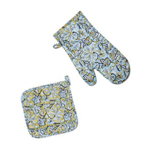 Load image into Gallery viewer, isolated image of oven mitt and pot holder. Image shows the difference between the two items. The mitt has a blue base and gold highlighted garden flowers. Potholder has a gold base and blue contrasting garden flowers. 