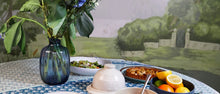 Load image into Gallery viewer, Blue berry pattern kitchen towel under a lunch spread. 